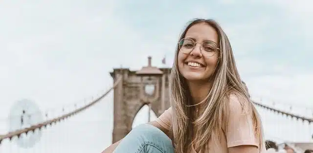 woman smiling in bridge