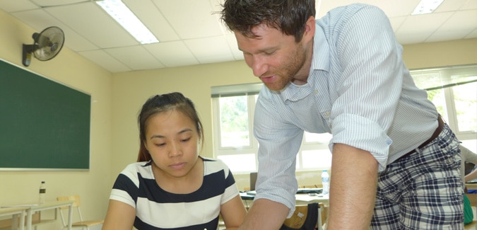 English teacher with student in Vietnam