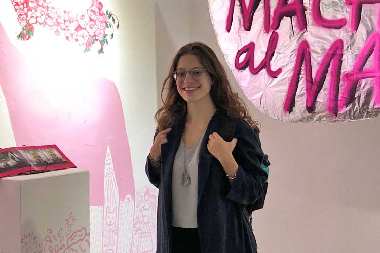 Me attending a cultural center exhibit on feminist protests in Mexico City.