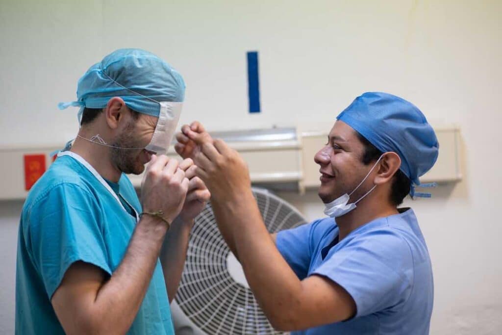 In the operating room with my co-worker Erick.