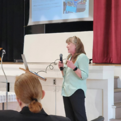 Woman presenting at Work & Travel USA conference