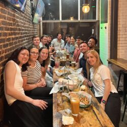 Group of trainees having dinner